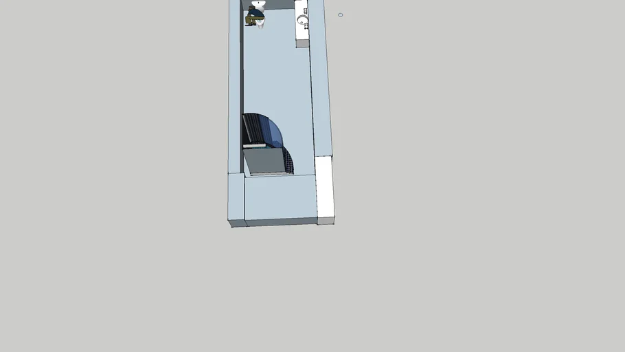man sitting on toilet in bathroom