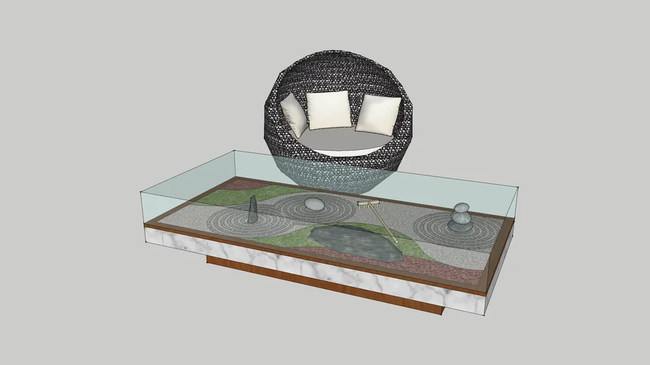 Mesa de vidrio con jardín zen adentro