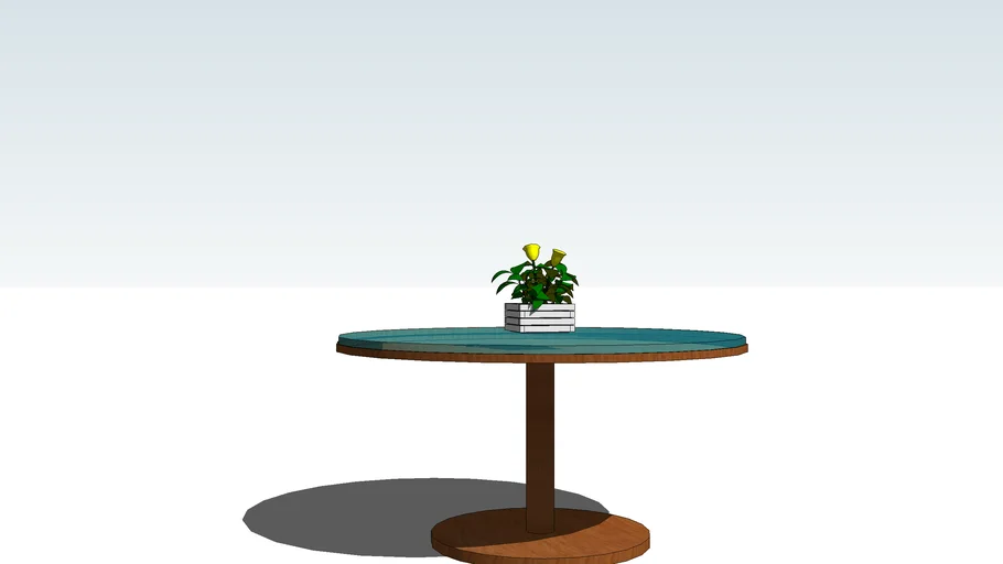 mesa com tampo de vidro e vaso de flor