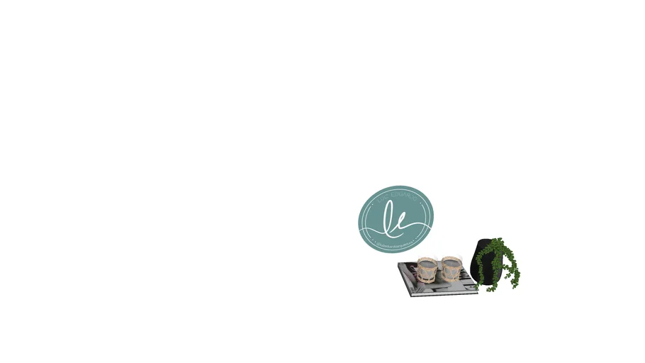 Decoración libro + velas + planta